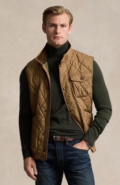 "Find RALPH LAUREN Beaton Quilted Vest on Editorialist. The between-season looks far more polished with a low-profile quilted vest popped with plenty of pocket space and shaped with snapped tabs at the waist. 27 1/2\" length (size Medium) Front zip closure with snap storm placket Stand collar Chest button-flap patch pocket; front patch pocket Adjustable snap side tabs Lined, with 96% recycled polyester, 4% polyester fill 100% recycled polyester Machine wash, tumble dry Imported" Mens Quilted Vest, Quilted Vest Outfit, Fall Vest Outfits, Mens Inspo, Sweatpants And Sweater, Classic Elegant Style, Harris Tweed Jacket, Turtle Neck Men, Fall Vest