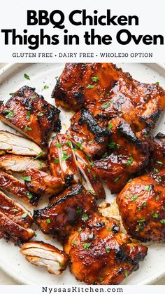 grilled chicken on a white plate with parsley