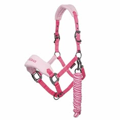 a pink horse bridle with reins and halters on it's sides