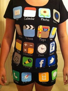 a woman is standing in front of a mirror with many app icons on her shirt