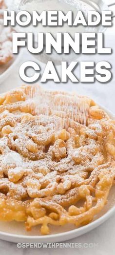 homemade funnel cake on a plate with the words homemade funnel cakes overlaying it