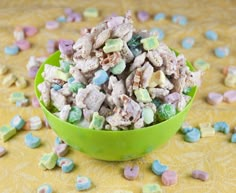 a green bowl filled with lots of cereal