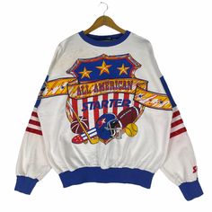 PLEASE ASK ANY QUESTION BEFORE BUYING THIS IS USED CLOTHING PLEASE DONT EXPECTED IT TO BE LIKE NEW OR IN PRISTINE CONDITION Vintage 90s Starter All American Sports NFL Sweatshirt tag Starter material cotton 70% polyester 30% saiz on tag M (Medium) Mesasures About ( Approximately) -Armpit to Ampit : 26 inch -Length (back collar down) : 26 inch Condition : used good condition 7.5/10 **No Tears And No Hole** **Have a stains see a picture details** 🎈PLEASE READ THE DESCRIPTION AND POLICY BEFORE BUY Throwback Long Sleeve T-shirt For Sports Events, Retro Sweatshirt For Game Day, Sports Season, Retro Sweatshirt For Game Day And Sports Season, Retro Sweatshirt For Game Day, Retro Long Sleeve Sports T-shirt, Retro Fan Gear Sweatshirt For Sports Season, Throwback Crew Neck Top For Sports Season, Throwback Crew Neck Top For Sports Events, 90s Graphic Print Sweatshirt For Sports Season