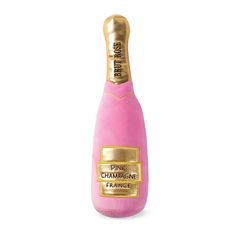 a bottle of pink champagne on a white background