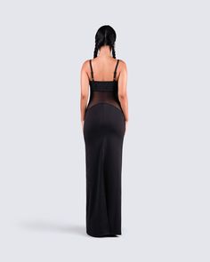 Step into the room looking classy, and way too good for them with this black maxi dress 😊 Made from a partially sheer ponte fabric, complete with rhinestones, adjustable straps, an invisible side zipper, and a column-shape 🖤 Leave little to the imagination -- 'dress' is sheer & undergarments are not included 👀 Sleeveless Maxi Dress With Built-in Bra For Evening, Sheer Bodice Maxi Dress For Night Out, Sheer Maxi Evening Dress For Night Out, Black Maxi Dress With Built-in Bra For Parties, Sheer Maxi Length Evening Dress For Night Out, Fitted Black Maxi Dress With Built-in Bra, Stretch Maxi Dress With Built-in Bra For Night Out, Elegant Floor-length Maxi Dress For Club, Black Maxi Dress With Sheer Back For Evening