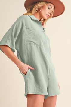 Material:100%Polyester The casual romper in a solid color for women features button closures, a turn-down collar, and short sleeves. Cut in an oversized silhouette, this romper is suitable for different body shapes, providing comfort and a relaxed fit. Perfect for creating a daily fashion look, it can be paired effortlessly with any shoes or sandals. Size Chart (CM) Sizes Bust Waist Sleeve_Length Length Hip Inseam Relax Relax Relax Relax Relax Relax S 104 112 41.8 80 114 7.8 M 110 118 43 82 120 Loose Romper, Pink Plain, Green Plain, Two Piece Short Set, Casual Rompers, Blouse Sleeveless, Graphic Apparel, Loungewear Set, Oversized Silhouette