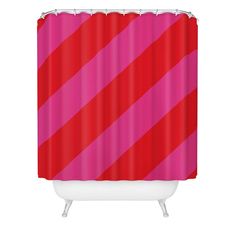 a red and pink shower curtain with diagonal stripes