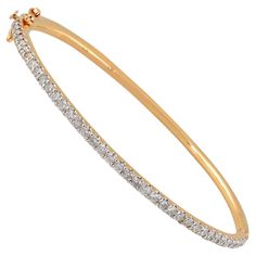 Item Code :- CN-30198A (14k) Gross Wt. :- 9.04 gm 14k Yellow Gold Wt. :- 8.71 gm Diamond Wt. :- 1.65 Ct. ( AVERAGE DIAMOND CLARITY SI1-SI2 & COLOR H-I ) Bangle Size :- 47 x 58 mm approx. ✦ Sizing ..................... We can adjust most items to fit your sizing preferences. Most items can be made to any size and length. Please leave a note at checkout or contact us via 1stDibs conversation. Even after purchasing the item, you can still ask us to adjust the size or length. We will try our best to Classic Hallmarked Diamond Bracelet, Classic Gold Bangle With Prong Setting, Sweet Alhambra Bracelet, Pave Bangle, Yellow Gold Jewelry, Jewelry Indian, Diamond Clarity, Pave Diamonds, Arm Band