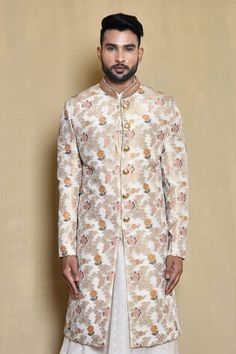 White sherwani with multi colored floral woven motifs. Comes with woven anarkali and churidar. - Aza Fashions Designer Multicolor Bandhgala With Chikankari Embroidery, Multicolor Chikankari Embroidery Bandhgala For Diwali, Multicolor Chikankari Bandhgala For Diwali, Festive Multicolor Bandhgala With Chikankari Embroidery, Multicolor Sherwani With Chikankari Embroidery For Festivals, Designer Multicolor Sherwani For Festive Occasions, Ceremonial Anarkali Bandhgala For Transitional Season, Fitted Anarkali Sherwani With Naqshi, Festive Multicolor Naqshi Kurta