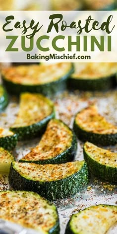 sliced zucchini on a baking sheet with the title overlay reading easy roasted zucchini