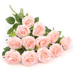 a bunch of pink roses with green leaves