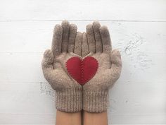 "Perfect wool gloves for your wife, girlfriend, mom, best friend or for yourself for Christmas, Valentine's Day, Holiday, anniversary, birthday, etc. These taupe mittens with heart are \"one size fits all\" type, but please ask me about the size if you hesitate or if the hands are too big or too small. These heart gloves are made of high quality wool. They are soft & warm and the felted application is hand stitched. Please hand wash in lukewarm water and lay flat to dry. Fingerless option: h Heart Gloves, Beige Gloves, Grey Gloves, Handmade Birthday Gifts, Valentine Gifts For Girlfriend, Wool Gloves, Wool Mittens, Knitting Gift, Winter Gift