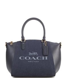 COACH Handbags, Purses & Wallets | Dillard's Fake Coach Purses, Top Handle Bag In Coated Canvas With Removable Pouch, Evening Bag With Top Carry Handle In Coated Canvas, Evening Tote Bag In Coated Canvas, Evening Coated Canvas Tote Bag, Evening Coated Canvas Bag With Top Handle, Classic Bag With Detachable Handle In Coated Canvas, Chic Coated Canvas Bag With Double Handle, Modern Coach Top Handle Bag