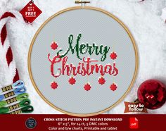 a cross stitch pattern with the words merry christmas