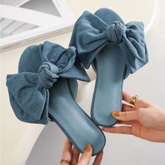 Denim Bow Sandal Memory Foam Padding For Comfort Slip On Casual Fabric Sandals With Flat Heel, Light Blue Flat Sandals For Summer, Casual Flat Heel Fabric Sandals, Flat Fabric Sandals For Summer, Denim Blue Open Toe Sandals For Summer, Light Blue Flat Summer Sandals, Flat Fabric Sandals For Vacation, Summer Denim Sandals For Beach, Light Blue Flat Casual Sandals