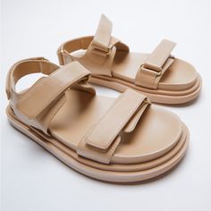 Genuine Zara New With Tag Material: Leather Upper Color: Beige Summer Leather Sandals With Elevated Luxury Vibes. Love Neutral Color To Go With Most Outfits. Comfortable Wide Footbed With Adjustable Straps. Euro Size 37(6.5), 39(8) Chic Double Strap Footbed Sandals For Spring, Chic Summer Double Strap Footbed Sandals, Beige Double Strap Sandals For Summer, Beige Double Strap Footbed Sandals For Summer, Chic Beige Leather Footbed Sandals, Spring Beige Leather Footbed Sandals, Leather Footbed Sandals In Beige For Spring, Beige Footbed Sandals With Adjustable Strap For Summer, Chic Leather Footbed Sandals For Day Out