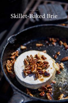 a skillet with some food in it on top of a grilling pan that says skillet - baked brie