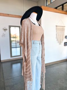 For those days when we wish we could layer on cardigans and dusters, but the weather tells you no. A perfect light layer to pretend it's Fall! A lightweight kimono with MAJOR boho vibes! Specs taken from size Small/Medium: Length: 45.5" Material: 55% Cotton// 45% Polyester Bohemian Knit Cover-up For Beach Season, Oversized Bohemian Fall Cover-up, Casual Fall Cover-up For Layering, Bohemian Summer Cover-up For Layering, Bohemian Knit Cardigan For Fall, Bohemian Cover-up For Layering, Trendy Spring Festival Cardigan, Fall Beach Open Knit Outerwear, Lightweight Cardigan For Beach In Fall