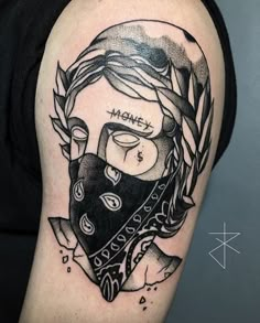 a black and white tattoo with a woman's face