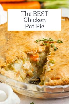 the best chicken pot pie with a piece missing from it and carrots in the background