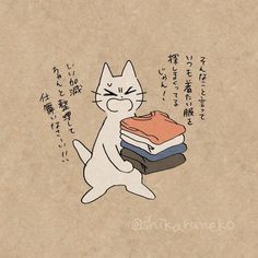 an image of a cat holding books in its paws