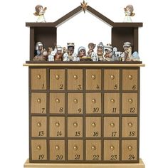 a wooden calendar with many figurines on it's sides and numbers in the middle