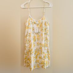 Hippie Rose Floral Yellow Dress Size Xs New With Tags Excellent Condition Casual Rose Print Floral Dress For Spring, Casual Spring Floral Dress With Rose Print, Casual Sleeveless Rose Print Dress, Casual Sleeveless Mini Dress With Rose Print, Casual Rose Print Beach Dress, Casual Summer Mini Dress With Rose Print, Casual Rose Print Mini Dress For Spring, Casual Rose Print Mini Dress For Brunch, Floral Yellow Dress