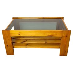 a wooden coffee table with glass top