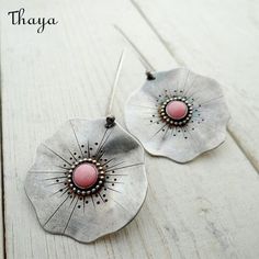 Thaya Vintage Ruffle Earrings exude timeless glamour with a vintage twist. These earrings feature intricate ruffled details that harken back to the elegance of bygone eras.Crafted with exquisite attention to detail, these earrings showcase delicate ruffles that create a whimsical and feminine look. The vintage-inspired design adds a touch of nostalgia and sophistication to any ensemble.  -Brand: Thaya  -Color: Antique Silver  -Style: Literary Retro  -Material: Alloy  -Shape: Lotus Leaf Poppy Earrings, Pink Poppy, Dangle Earrings Wedding, Flower Drop Earrings, Metal Clay Jewelry, Stone Dangle Earrings, Leaf Flower, Precious Metal Clay, Lotus Leaf