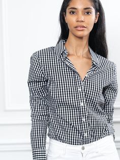 Meet your new closet staple: the large check shirt, in our perfect fit cotton stretch.

The Shirt reimagined for the perfect fit – powered by No Gape® button technology. Bye bye blouse gape, Hello The Shirt. Patented and designed by Rochelle Behrens to eliminate blouse gape. 


 
 * Made in Portugal 
 * Powered by our patented NO GAPE™ button technology. 
 * 75% Cotton, 20% Nylon, 5% Spandex 68% Cotton/28% Polyamide/4% Lycra

P - 6000A - Icon - Large Check 6000A - Icon - Large Check Fitted Black Top With Spread Collar, Slim Fit Top With Spread Collar For Daywear, Classic Slim Fit Tops For Daywear, Fitted Tops With Spread Collar, Black Fitted Shirt For Daywear, Fitted Cotton Top With Spread Collar, New Closet, Women Artisans, The Shirt