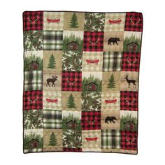 a blanket with moose and trees on it