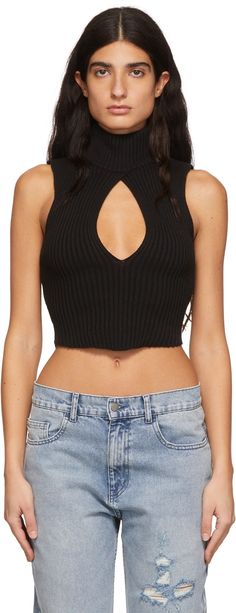 Rib knit tank top. · Turtleneck · Cut-outs at front and back Supplier color: Black Black Turtleneck Tank Top, Edgy Black Turtleneck Top, Turtleneck Cutout, Chic Black Cutout Crop Top, Fitted Black Tank Top With Cutout, Danielle Guizio, Sleeveless Turtleneck, Turtle Neck Top, Black Sleeveless