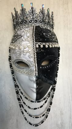 Unique full face mask, handcrafted in dramatic black and white. Embossed silver/white brocade and black velvet fabric embellished with diamantes, pearls, braid, crystals and jet beads. Stunning wall decoration for your home or studio or perfect as a unique statement piece for that masquerade ball or party.  Each Tiaura Arts piece comes with signed and dated certification detailing its unique title and catalogue number.  To see the full range of my work, I invite you to visit my website: www.tiau Luxury Artistic Masks For Mardi Gras, Luxury Masks And Prosthetics For Mardi Gras, Silver Full Face Mask For Masquerade, Silver Full Face Masquerade Mask, Full Face Silver Masquerade Mask, Masquerade Mask Full Face, Venetian Masks Art, Masquerade Ball Outfits, Venice Carnival Costumes