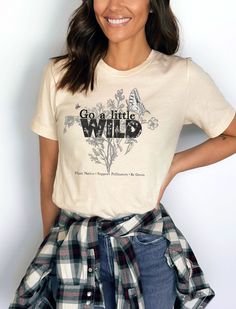 There's a lot of boring grass out there. That monoculture culture of ours is harmful and short-sighted. Have fun promoting conservation and biodiversity with this sassy shirt. Go a little wild planting wildflowers, native plants, staying pesticide free, and all over being a cool person to the Earth. The perfect gift for an organic gardener, conservationist, ecologist, and all around cool person who can handle living outside the silly boxes we've drawn ourselves into. This classic unisex jersey s Letter Print T-shirt For Outdoor In Spring, Letter Print T-shirt For Outdoor Spring Activities, Organic Graphic Print T-shirt For Spring, Organic Tops With Graphic Print For Spring, Organic Graphic Print Top For Spring, Casual Short Sleeve Gardening Shirt, Casual Short Sleeve Shirt For Gardening, Mangrove Illustration, Planting Wildflowers