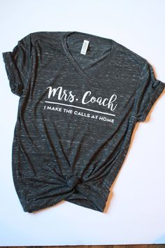 a t - shirt that says, mrs coach i make the call at home on it