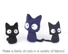 three small stuffed cats sitting next to each other with the caption make a family of cats in a variety of fabrics