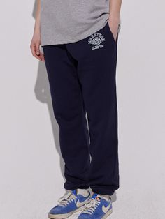 Editor's NotesFeaturing a small graphic print, these casual jogger sweatpants are cut from a cotton jersey and fitted with a comfortable elasticated waistband and cuffs. Pair yours with one of the club 98 graphic print sweat series.- Elasticated waistband- Two front on-seam pockets- Graphic print at the front- Logo label at the back- Elasticated cuffs- Tapered fitMeasurements (in.)1(Medium) / 2(Large)- Total Length: 39.4 in./ 40.6 in.- Waist: 13.0 in./ 13.8 in.- Thigh: 12.6 in./ 13.0 in.- Rise: Sports Cotton Pants With Logo Print, Cotton Sportswear Bottoms With Logo Print, Sporty Relaxed Fit Pants With Logo Print, Athleisure Cotton Bottoms With Logo Print, Cotton Athleisure Bottoms With Logo Print, Casual Jogging Bottoms With Logo Print, Relaxed Fit Logo Print Sweatpants For Athleisure, Relaxed Fit Athleisure Sweatpants With Logo Print, Casual Sweatpants With Logo Print For Loungewear