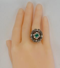 Art Deco Ring, Genuine Emerald Ring, Natural Diamond Ring, May Birthstone & 14K White Gold c.1920, Elegant Ring, Vintage Ring. This stunning estate ring is finely crafted in solid 14K White Gold and set with genuine Earth mined natural emerald and genuine diamonds. The center bezel set Emerald measures 5mm x 4.5mm (about .35ct). This is a very clean and transparent emerald with amazing intense green color with Natural inclusions. There are 56 natural diamonds in this ring for the total weigh Art Deco Green Emerald Ring With Rose Cut Diamonds, Art Deco Emerald Ring With Rose Cut Diamonds, Antique Emerald Ring With Center Stone, Victorian Emerald Ring With Rose Cut Diamonds, Antique Emerald Cut Emerald Ring With Center Stone, Victorian Green Emerald Ring With Rose Cut Diamonds, Victorian Emerald Ring Collectible, Victorian Emerald Collectible Ring, Victorian Multi-stone Green Jewelry