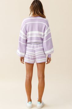 Striped lilac shorts.Knit fabric.Drawstring waist. Netflix and chill? Working from home? We've found the perfect lounge set and can guarantee you won't want to take it off. Our Carlo shorts are comfortable enough to wear around the house all day, but chic enough to run errands in effortless style. Team them with their matching top and sneakers for a look we are loving. MODEL INFOModel is wearing size SHeight: 5'7"Bust: 32"Waist: 24"Hips: 34"Size Guide CAREHand Wash Cold. Do Not Ir Cotton Shorts Loungewear Matching Set, Trendy Purple Loungewear Shorts, Playful Loungewear Short Set, Summer Purple Lounge Shorts, Striped Shorts With Built-in Shorts For Loungewear, Summer Loungewear, Shorts Sets, Drawstring Waist Shorts, Red Bridesmaids