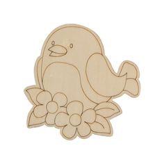 a wooden cutout of a bird with flowers