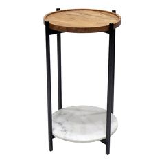 a round wooden table with black metal legs and a marble shelf on the bottom that holds a wood tray