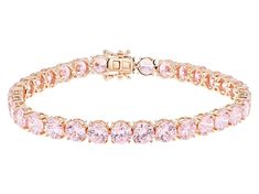 Bella Luce® pink diamond simulant 37.47ctw round, Eterno™ 18k rose gold over sterling silver tennis bracelet. Measures approximately 7.25" - 8" L x 0.25" W and has a hidden box clasp closure. Diamond equivalent weight is 22.70ctw. Pink Jewelry Bracelets, Pink And Gold Bracelet, Gold Pink Jewellery, Gold And Pink Bracelet, Pink Prom Accessories, Fine Jewelry Rose Gold Tennis Bracelet, Pink Diamond Bracelet, Rose Gold Round Cut Tennis Bracelet, Fine Jewelry Rose Gold Round Cut Tennis Bracelet