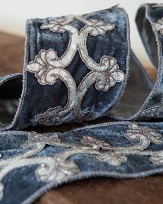 an old pair of blue jeans with silver sequins