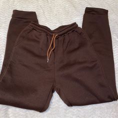 Brand New Never Been Worn No Flaws Pretty Chocolate Brown Cropped Hoodie Best For Xs-S Very Comfortable Just Doesn’t Fit Me The Way I Would Like Cozy Fleece Joggers For Fall, Fleece Sweatpants For Leisure In Fall, Fleece Joggers With Drawstring For Fall, Fall Fleece Joggers With Drawstring, Brown Bottoms For Winter Streetwear, Brown Winter Streetwear Bottoms, Fall Fleece Sweatpants With Drawstring, Fall Fleece Joggers For Leisure, Fall Leisure Fleece Joggers