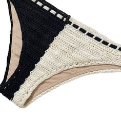 Zimmermann Clover Crochet Bikini Set in Black & WhiteSize 1 / SColor Black and creamPreloved **Some light yellowish spots at the bikini bottoms. Unsure if they are removable. Website DetailsSelf: 100% cottonLining: 92% polyamide, 8% elastaneTies: 80% polyamide, 20% elastane. Made in China. Hand wash. Unpadded. Halterneck and back tie closures. Side tie hip closures. Lightweight crochet fabric. Sold as a set. Our Style No. ZMER-WX139. Manufacturer Style No. 4980WCLO.1141-YMost items are previousl Cream Stretch Bottoms For Beach, Stretch Cream Bottoms For Beach, Cream Stretch Bottoms For The Beach, Stretch Cream Bottoms For The Beach, Beige Brief Swimwear For Summer, Beige Beachwear Bottoms For Pool, Cream Triangle Top Swimwear For Beach, Cream Beachwear Swimwear For Pool, Cream Swimwear For Pool