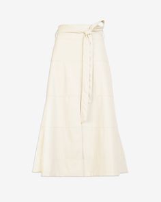 A signature silhouette, the Hudson Skirt is a staple piece in a new cream vegan leather. Featuring tiered seaming throughout the A-line shape and a midi fit for added interest, Hudson is a high-waisted silhouette with a self-tie belt for versatility of wear. This season, style the Hudson Skirt back to an every day flat or heel for polished day-to-night sensibility. Taylor Hudson, Belted Midi Skirt, Stylist Outfit, Cream Skirt, Tanya Taylor, Long Sleeve Sweater Dress, Plus Size Skirts, Night Looks, Staple Pieces