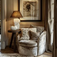 a living room filled with furniture and a lamp