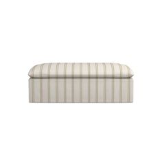 a white and beige striped bench with an upholstered seat cushion on it's side