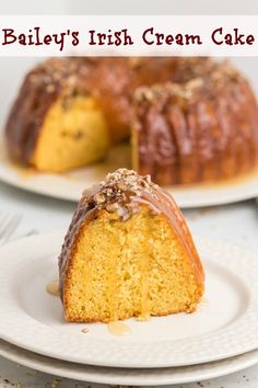 a bundt cake on a plate with a bite taken out of it and the words bailey's irish cream cake