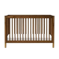 a wooden crib with white sheets on the bottom and side rails, against a white background